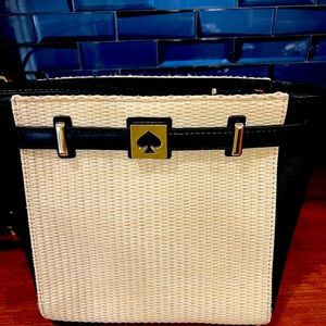 Beautiful Kate Spade Crossbody, woven bag with black leather trim, pink interior